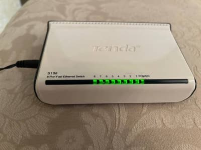 7 conmutadores Ethernet rápidos Netgear/Tenda/D-Link