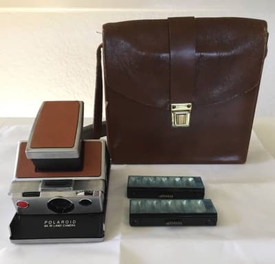 CÁMARA VINTAGE POLAROID LAND SX70